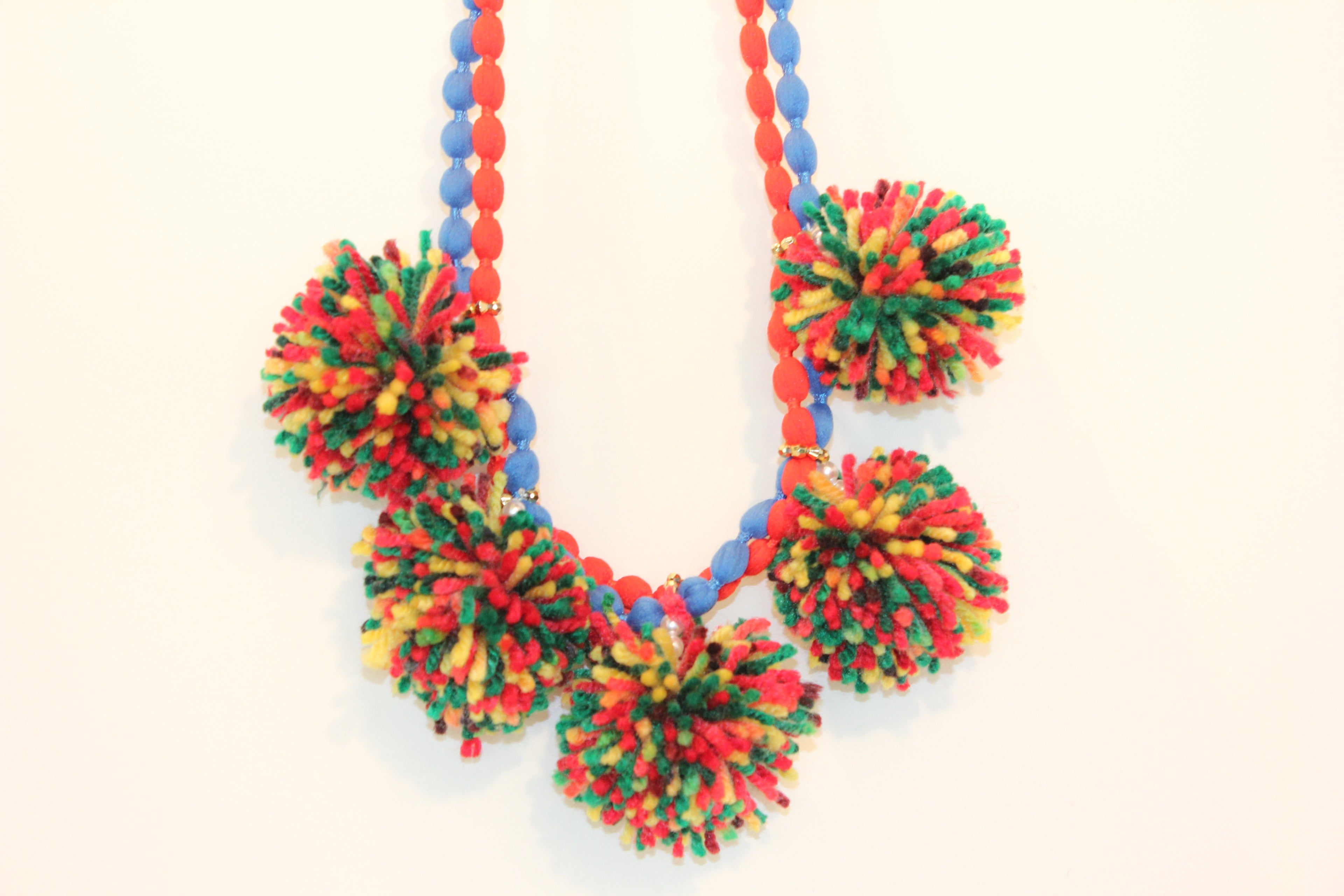 Handmade Red and Blue Cord Necklace with Large Multi-Color Pom-Poms